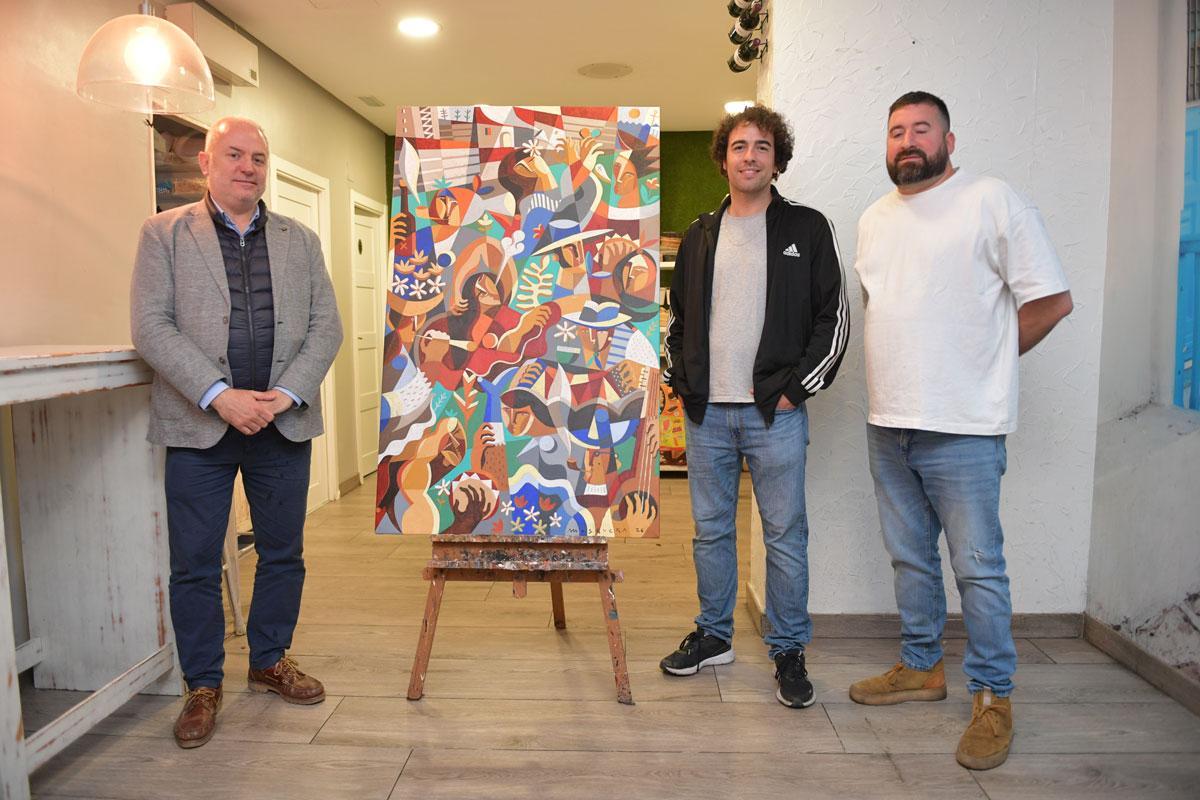 El concejal Gonzalo Castro, el presidente de la plataforma vecinal David Pujades y el creador del cuadro que acompaña el cartel de las fiestas, Alejandro Mosquera.