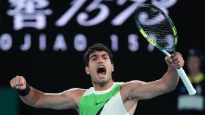 Carlos Alcaraz of Spain reacts during his mens singles final match against Novak Djokovic of Serbia at the Australian Open tennis championship in Melbourne, Australia, Sunday, Feb. 1, 2026. (AP Photo/Aaron Favila)