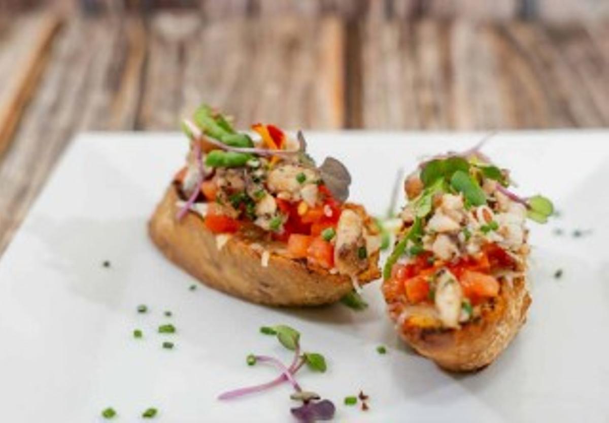 Bruschetta de sardina con mantequilla de ajo.