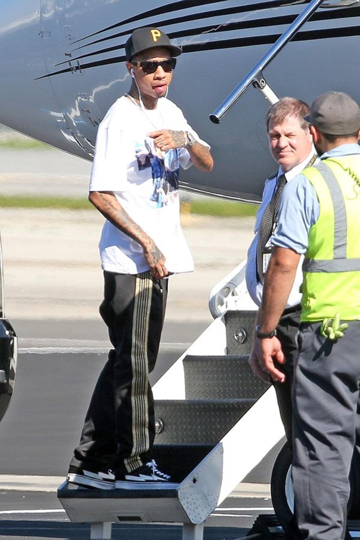 Viaje a Costa Rica: Tyga subiendo al avión