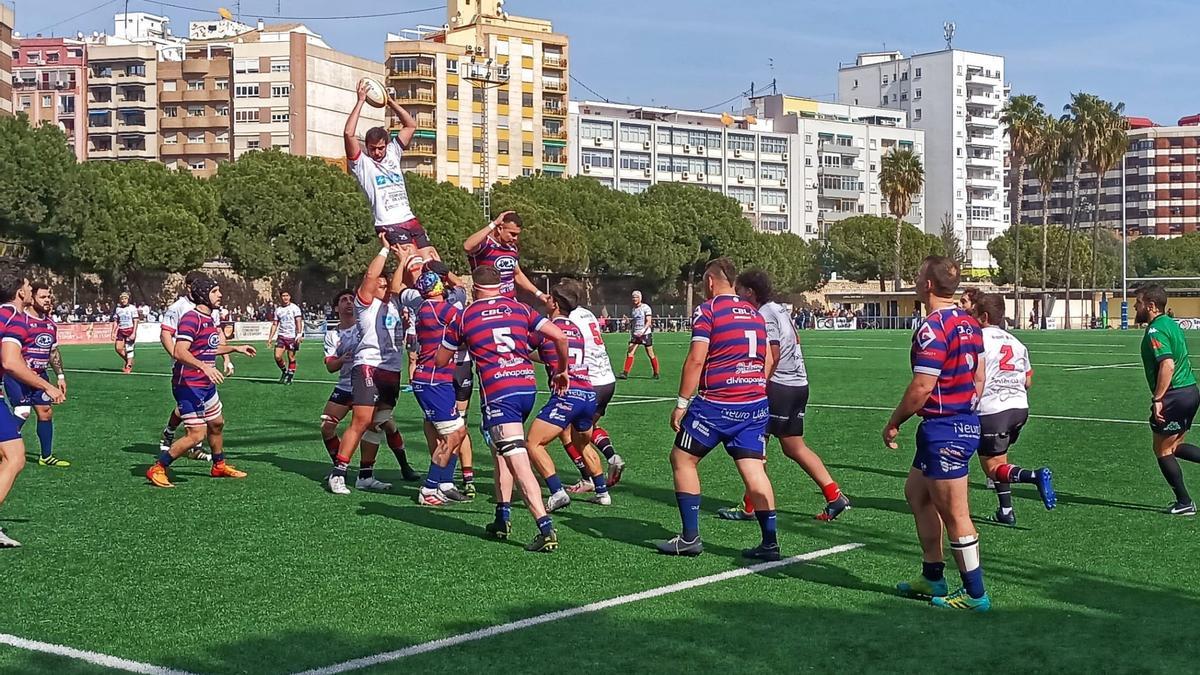 Derbi en el campo del Río entre CR San Roque y CAU Valencia.