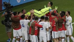 rpaniagua39094434 chile goalkeeper claudio bravo is thrown in the air after wi170628232712