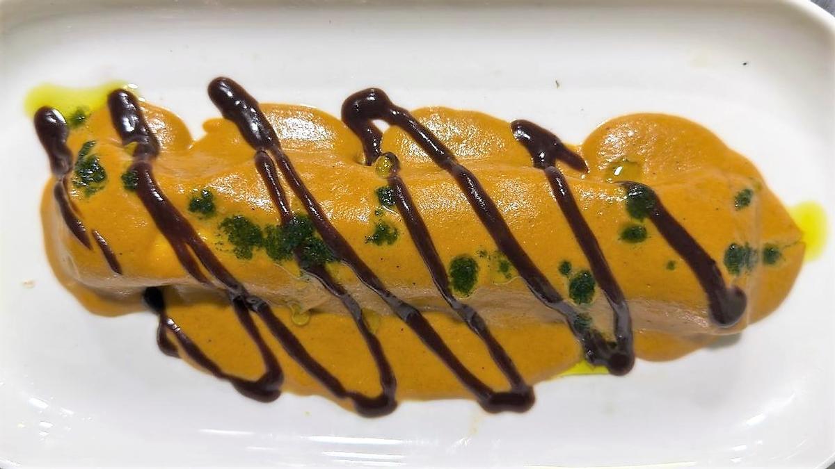 Canelón de asado con crema de 'rovellons' de Bar Muy Buenas.