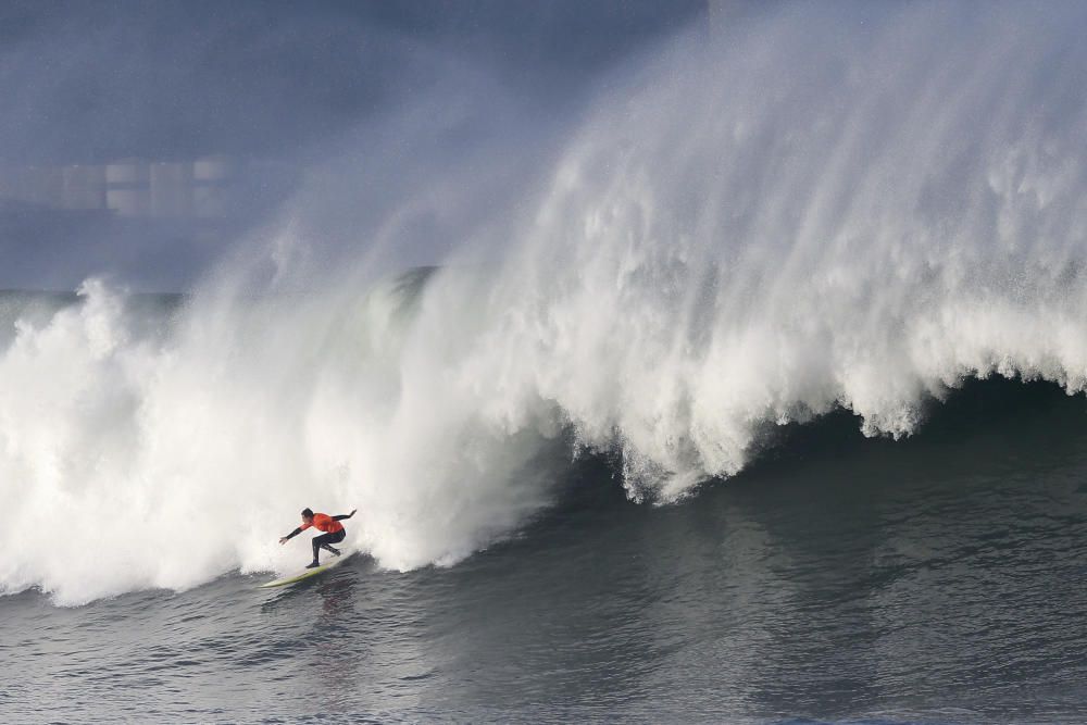 A surfer rides a wave during the Punta Galea Big ...