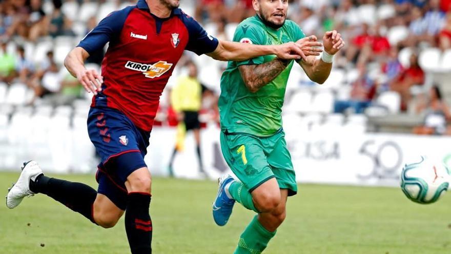 &#039;Portu&#039;, a la derecha, en un amistoso con la Real Sociedad frente al Osasuna.