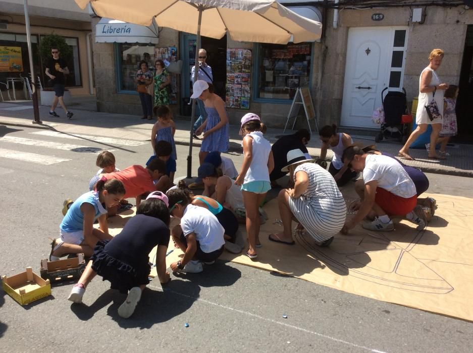 Cuando aún quedan varias horas para la procesión del Corpus las calles de Bueu ofrecen ya su mejor aspecto