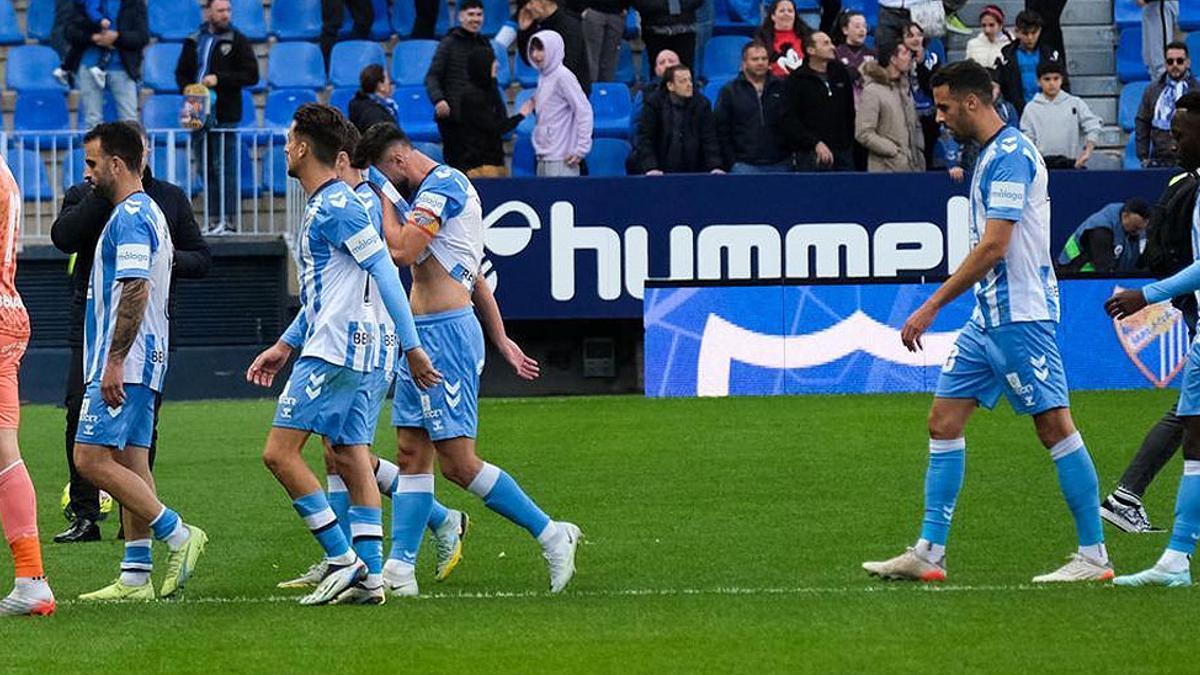 Los jugadores del Málaga, en un partido de la temporada.