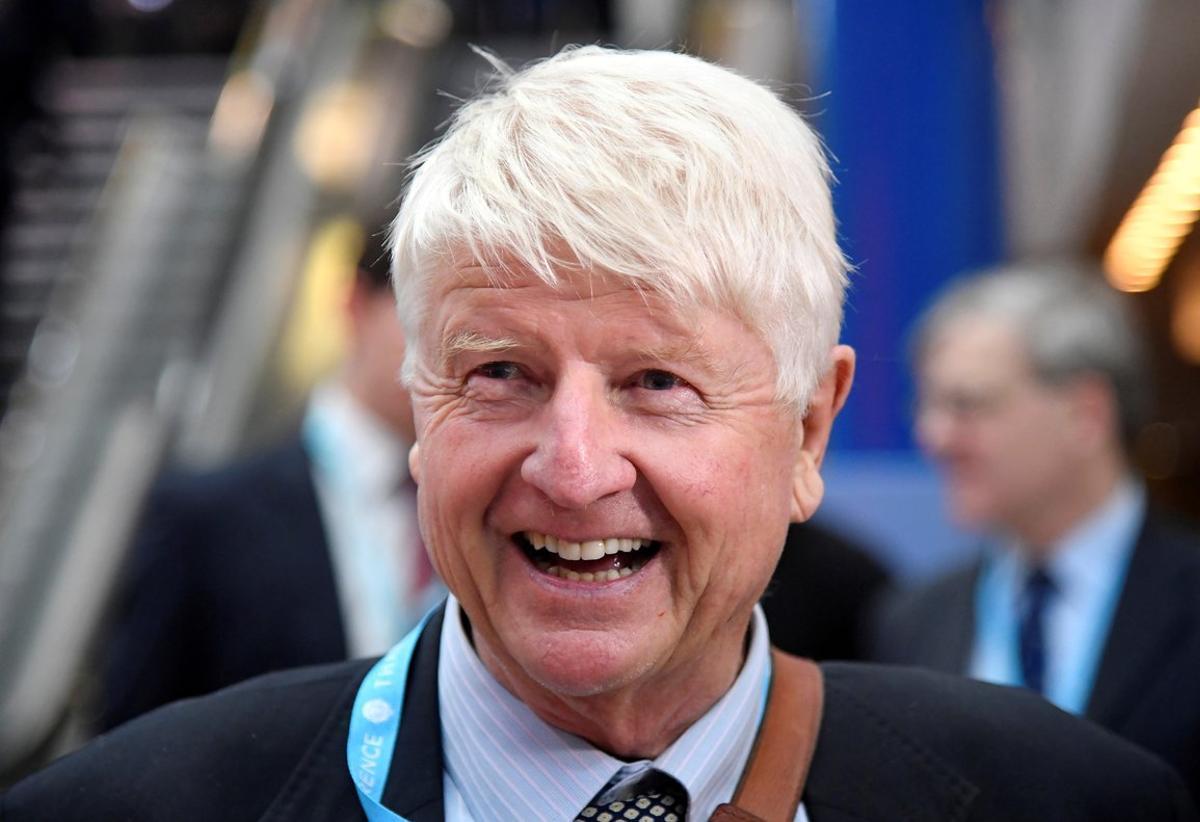 FILE PHOTO: Stanley Johnson, father of Boris Johnson, walks through the venue of the Conservative Party Conference in Birmingham, Britain, October 2, 2018. REUTERS/Toby Melville/File Photo