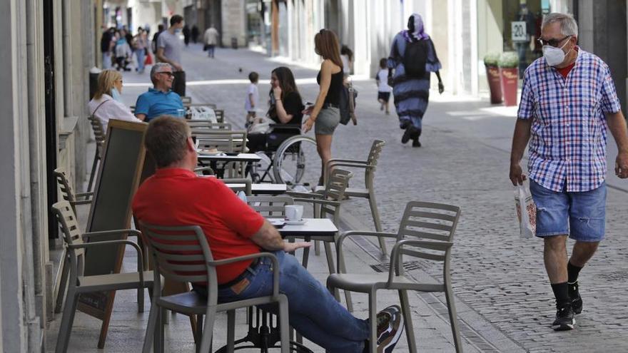 Gent als carrers de Girona