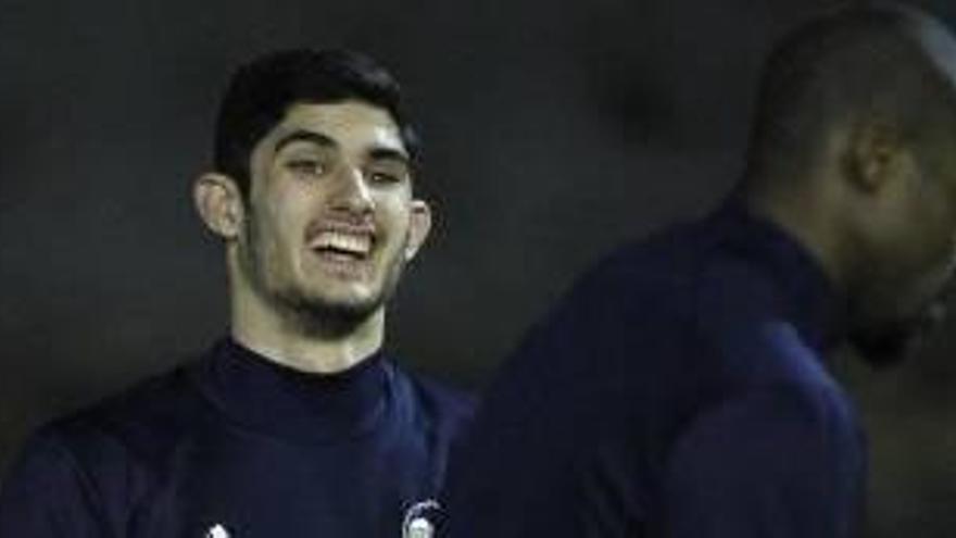 Guedes, con Kondogbia, en un entrenamiento en Paterna.