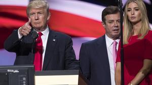 FILE - In this July 21, 2016 file photo, then-Trump Campaign manager Paul Manafort stands between the then-Republican presidential candidate Donald Trump and his daughter Ivanka Trump during a walk through at the Republican National Convention in Cleveland. Oleg Deripaska, a Russian billionaire close to President Vladimir Putin says he is willing to take part in U.S. congressional hearings to discuss his relationship with President Donald Trumpâ¿¿s former campaign chairman, Paul Manafort.  (AP Photo/Evan Vucci, File)