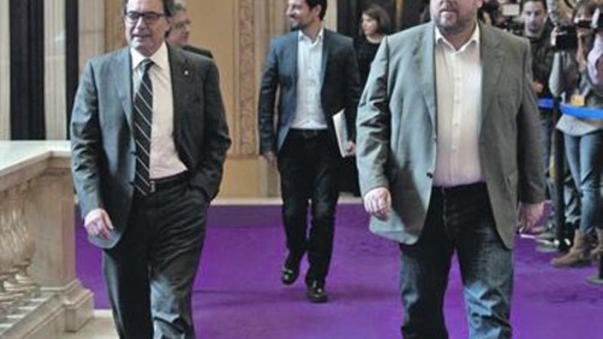 Mas y Junqueras, en el Parlament, al término de su reunión de ayer.