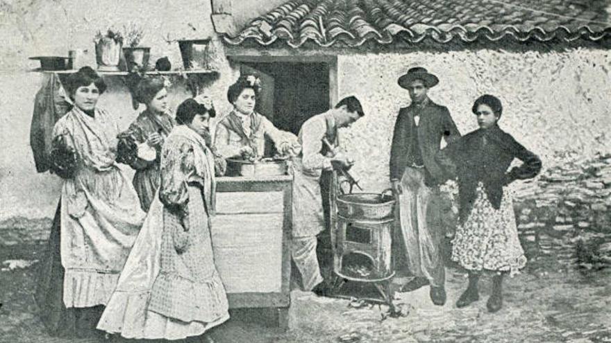 Un puesto de tejeringos en Málaga en una postal antigua.