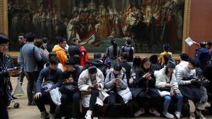 lainz46136825 visitors sit in front of the coronation of napoleon  a 1806 181204185926