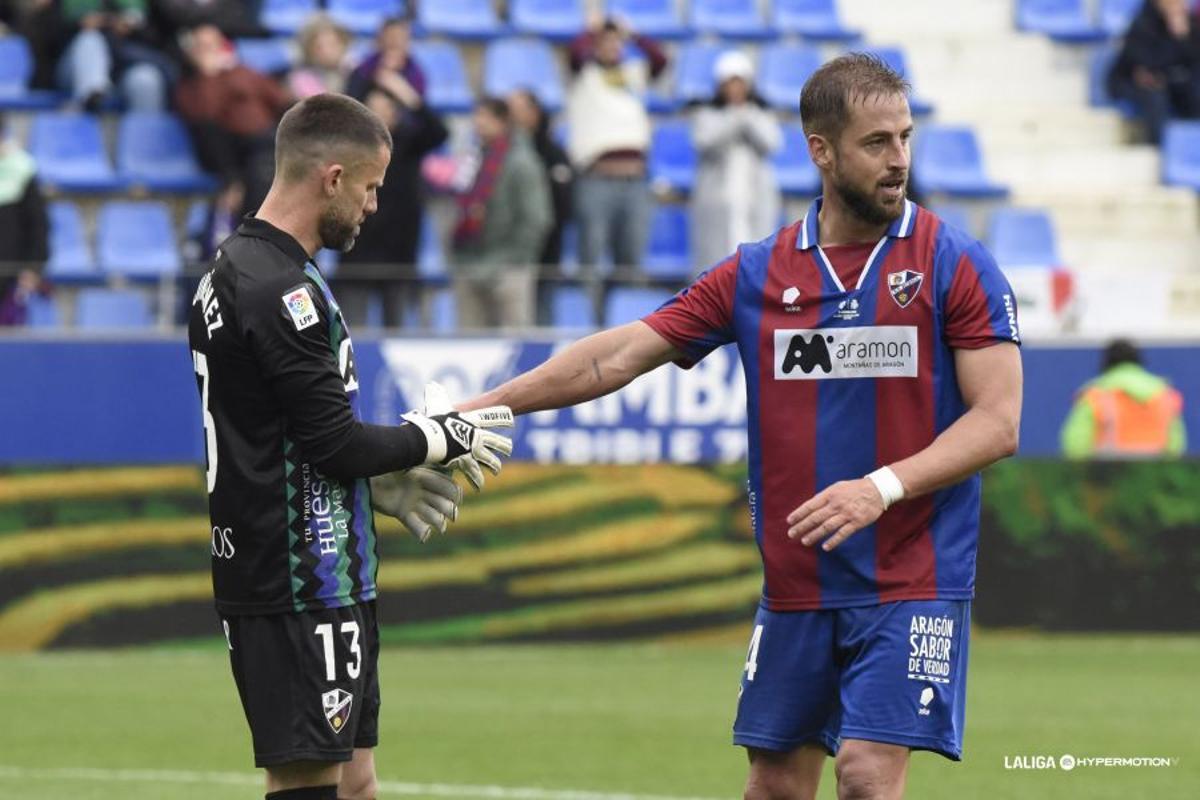 Pulido, con Dani Jiménez, durante el duelo ante el Deportivo