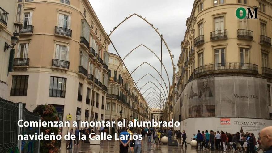 Instalación de las luces de Navidad en la calle Larios