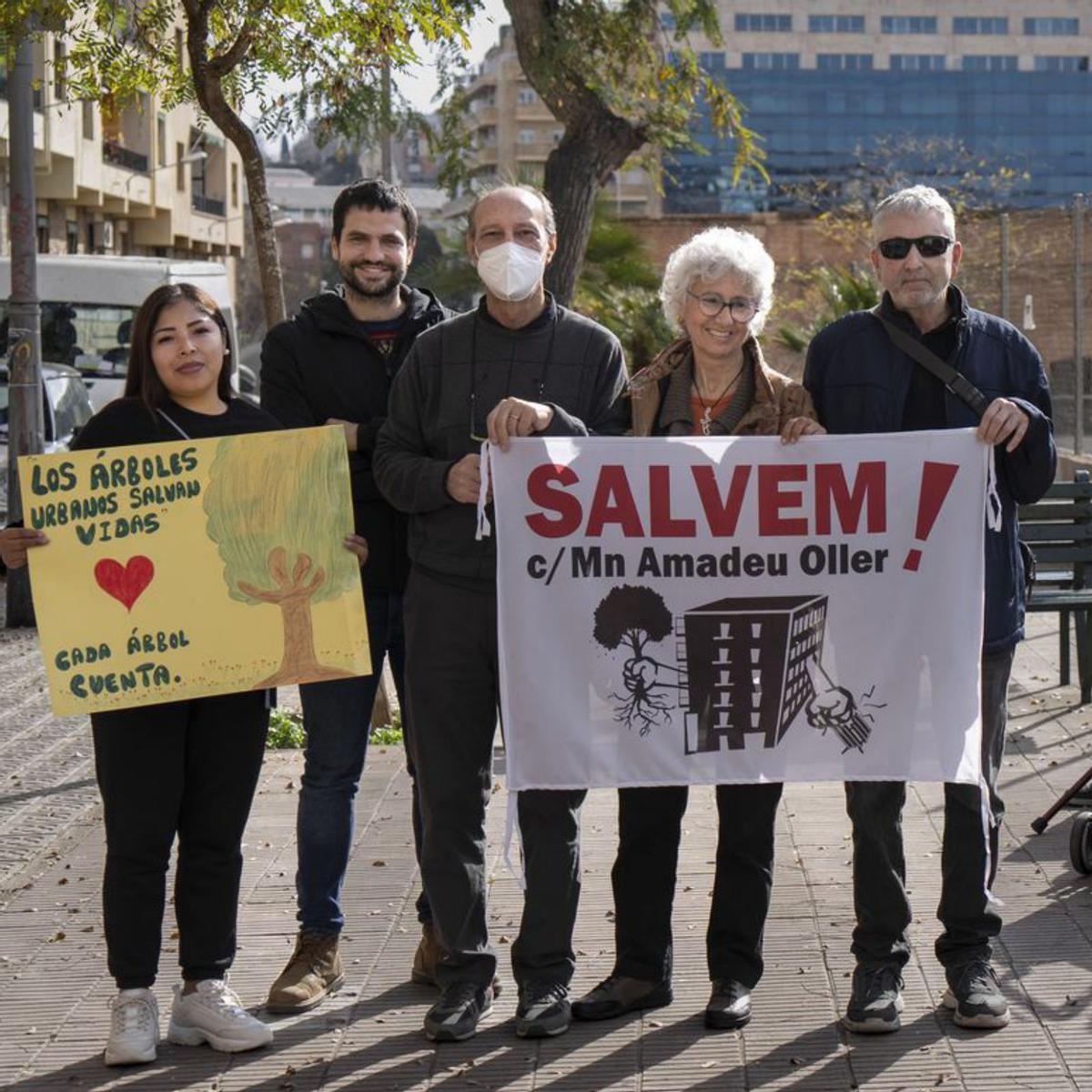 Lluita veïnal per salvar de la tala un jardí conquistat