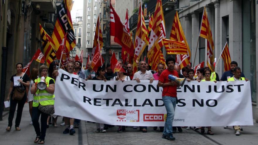 Manifestació a Girona contra el nou conveni del comerç