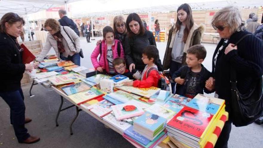 Llibre infantil Els escolars visiten la fira