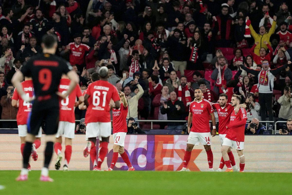 Benficas Vangelis Pavlidis celebrates the opening goal during a Champions League opening phase soccer match between SL Benfica and FC Barcelona at the Luz stadium in Lisbon, Tuesday, Jan. 21, 2025. (AP Photo/Armando Franca)