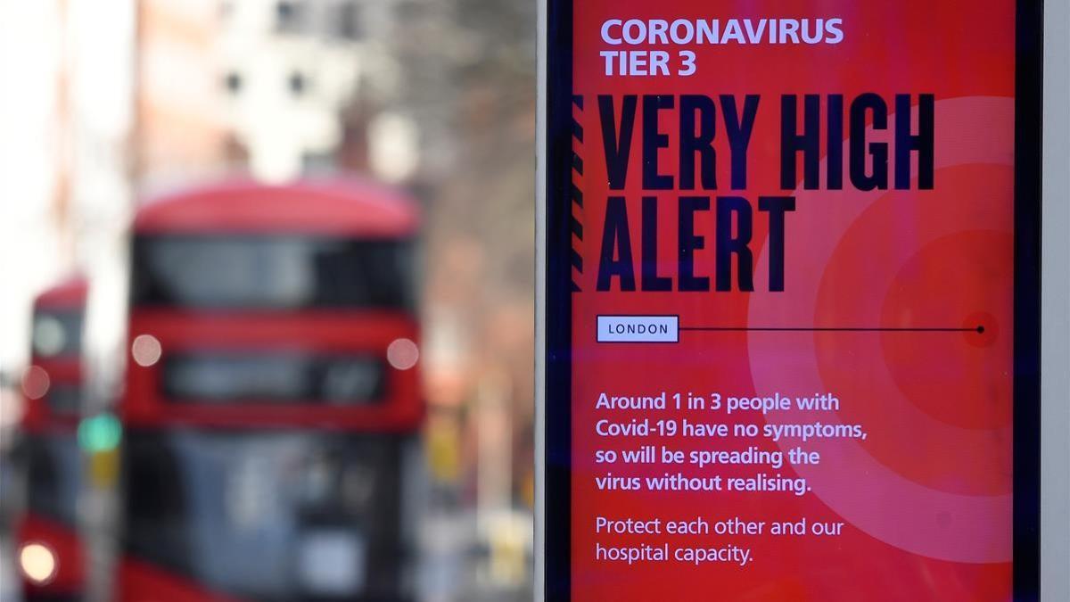A British government health information advertisement highlighting new restrictions amid the spread of the coronavirus disease (COVID-19) is seen in London  Britain  December 19  2020  REUTERS Toby Melville