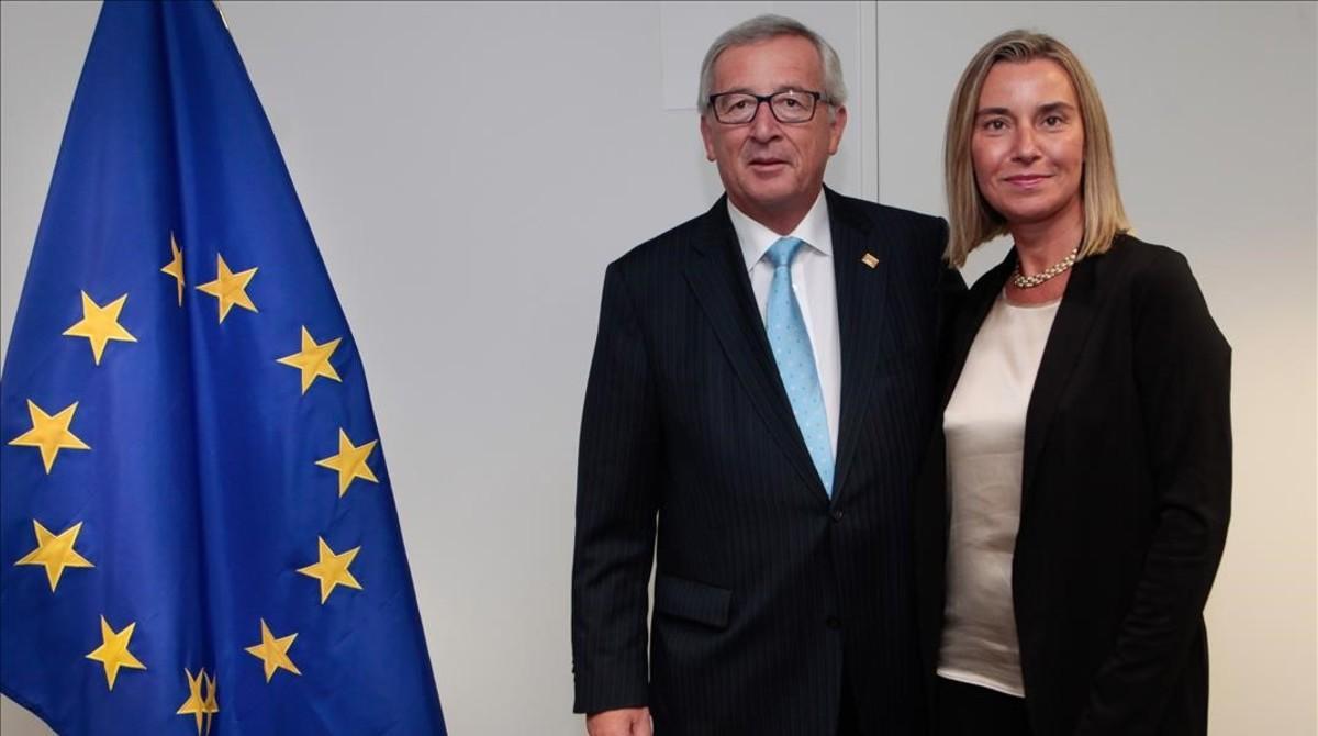 kamor27217378 embrace between federica mogherini  on the right  and jean c161109094525