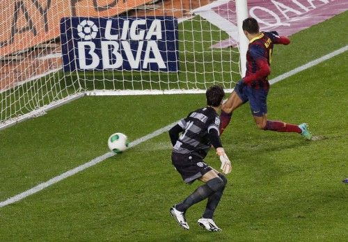 Barcelona's Alexis Sanchez scores his goal against Levante's goalkeeper Javi Jimenez during the Spanish King's Cup soccer match at Nou Camp stadium, in Barcelona