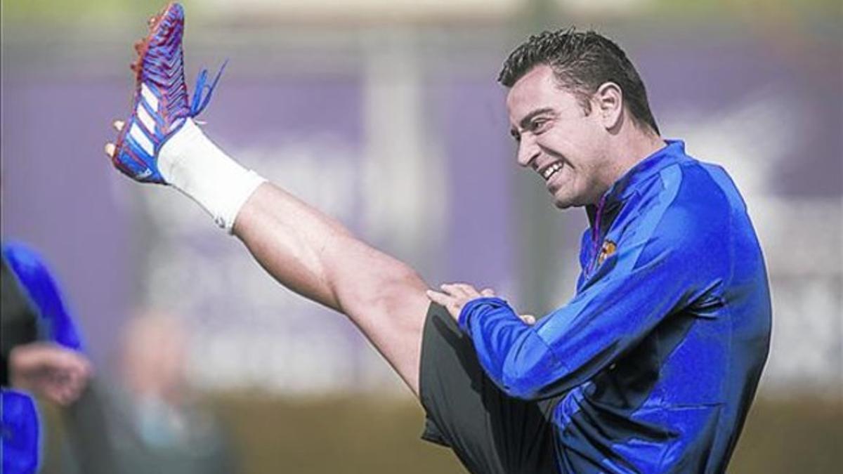 Xavi, ayer, en el entrenamiento del Barça en la ciudad deportiva.