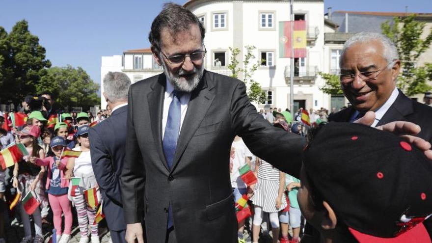 Rajoy y Costa, durante un receso de la cumbre.