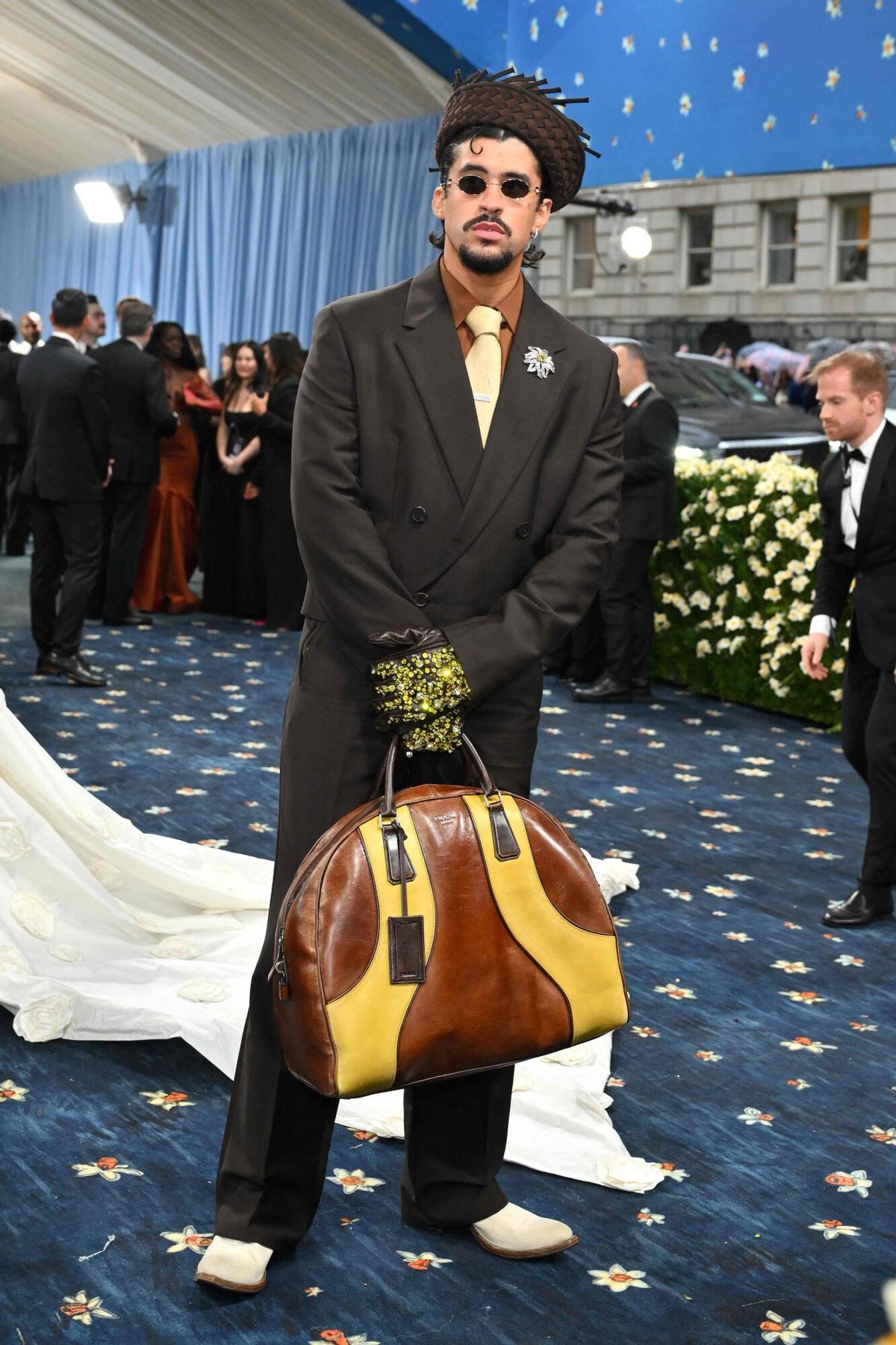 Puerto Rican singer Bad Bunny arrives for the 2025 Met Gala at the Metropolitan Museum of Art on May 5, 2025, in New York. The Gala raises money for the Metropolitan Museum of Art's Costume Institute. The 2025 Met Gala is themed "Tailored for You," aligning with the Costume Institute’s exhibition, "Superfine: Tailoring Black Style," set to open to the public on May 10. (Photo by ANGELA WEISS / AFP)