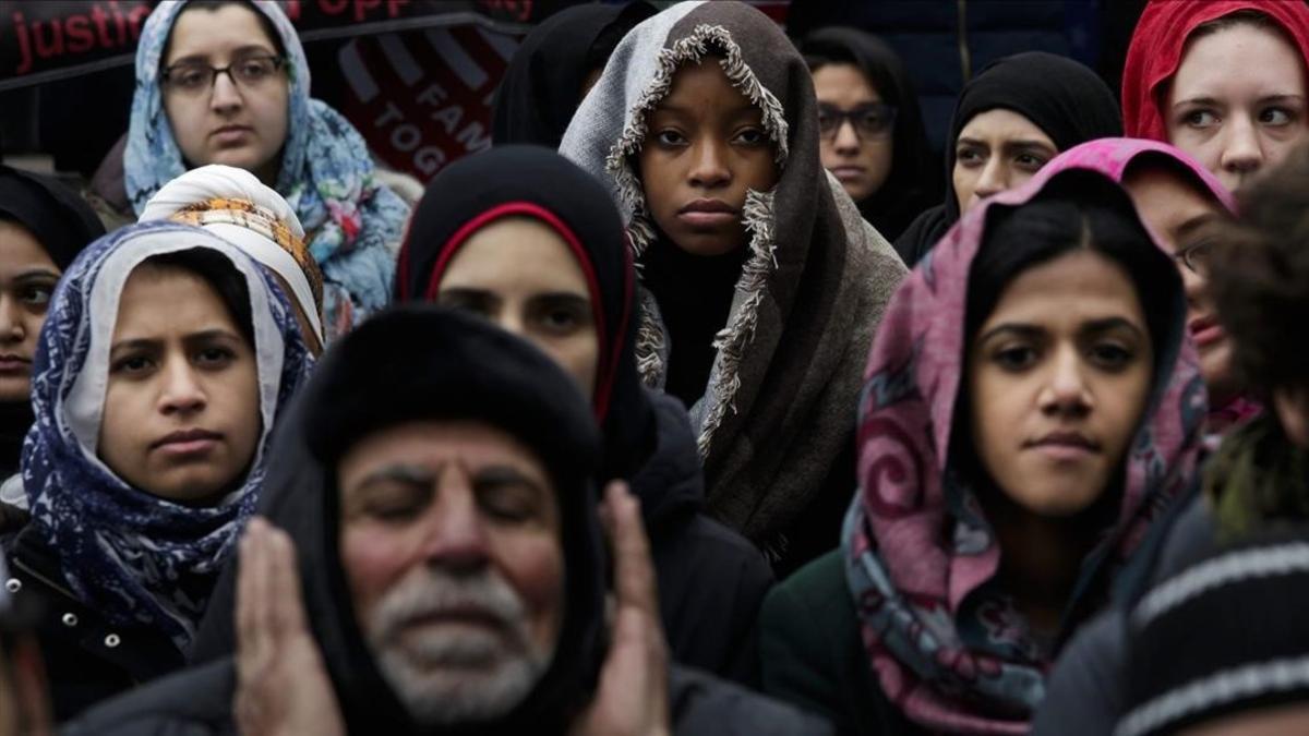 Inmigrantes en Nueva York en una manifestación contra Trump.