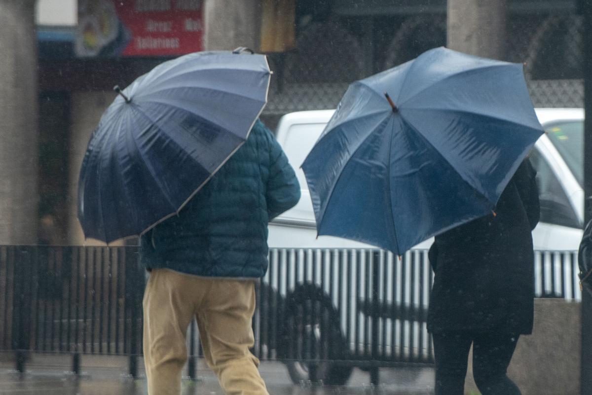Varias personas con paraguas un día de lluvia, en imagen de archivo.