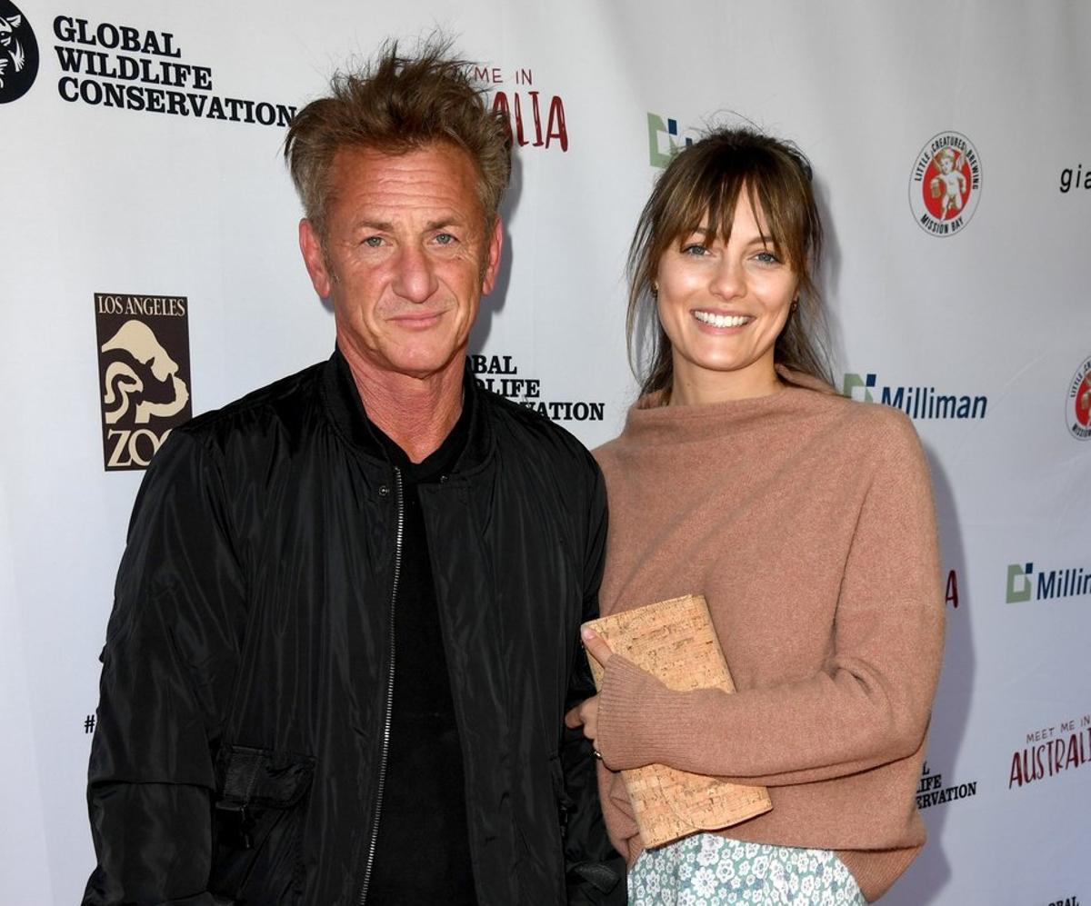 LOS ANGELES, CALIFORNIA - MARCH 08: Sean Penn (L) and Leila George arrive at the Meet Me In Australia event benefiting Australia Wildfire Relief Efforts at Los Angeles Zoo on March 08, 2020 in Los Angeles, California.   Kevin Winter/Getty Images/AFP