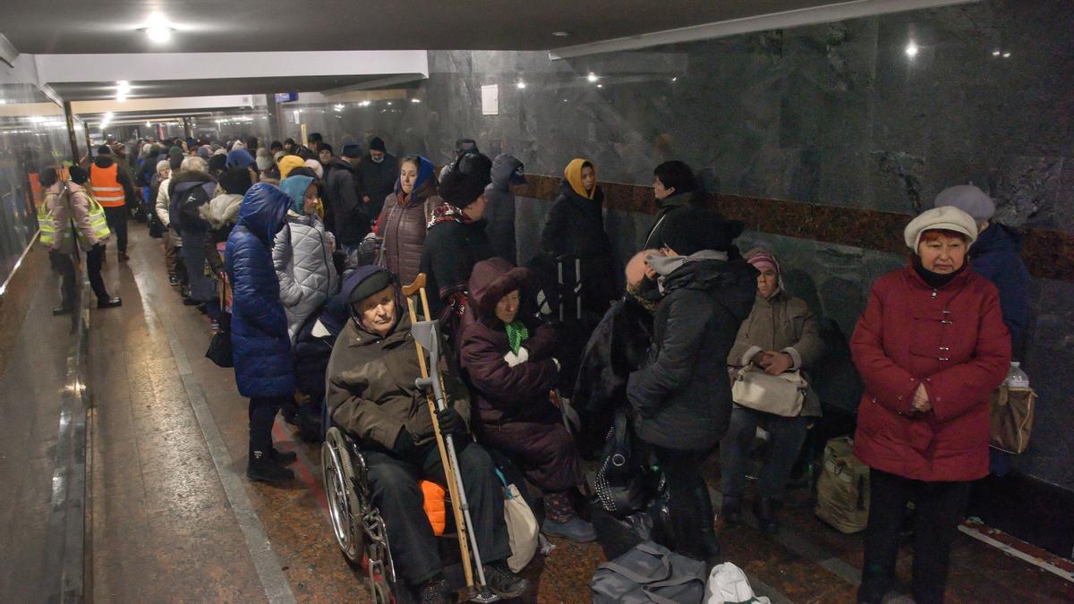 Ukrainian refugees at the train station in Lviv