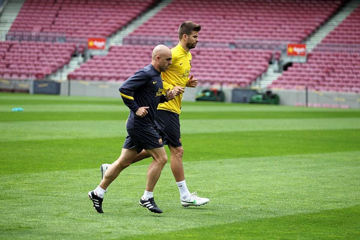 Juanjo Brau, junto a Gerard Piqué durante la etapa de ambos en el Barça