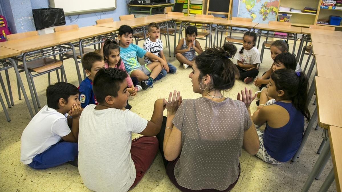 Vuelta al colegio tras las vacaciones estivales. En la imagen la escuela El Til.ler de Barcelona.