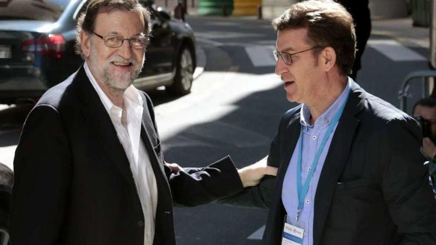 Rajoy y Feijóo el pasado mes de marzo en el congreso provincial del PP de Pontevedra.