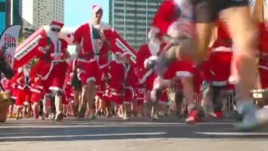 Miles de Papá Noel recorren el centro de Sydney