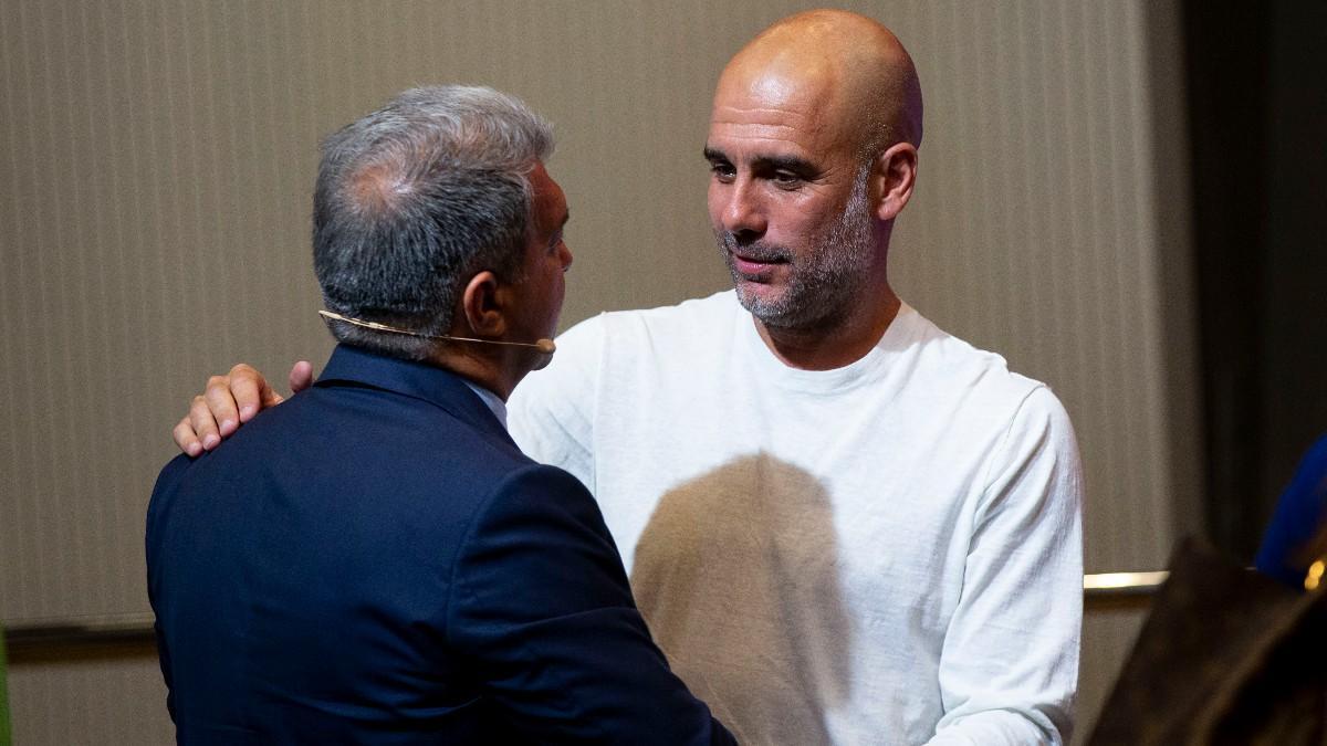 Pep Guardiola, junto a Joan Laporta