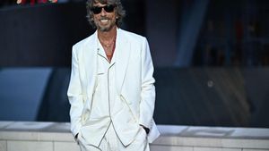 (FILES) Italian fashion designer Pierpaolo Piccioli poses on the red carpet as he arrives for The Prelude to the Olympics at The Fondation Louis Vuitton in Paris on July 25, 2024, ahead of the 2024 Paris Olympics. Italian designer Pierpaolo Piccioli has been named creative director at fashion house Balenciaga, taking over from Georgian designer Demna, parent company Kering said May 19, 2025. (Photo by JULIEN DE ROSA / AFP)