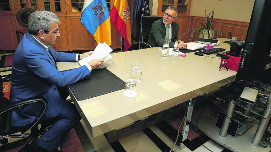 Román Rodríguez con el presidente Torres en una reunión por videoconferencia esta semana.