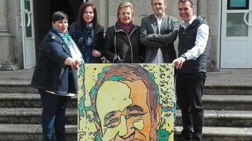 María José González, concejala de Cultura, y Enrique Cabaleiro, alcalde de Tui, junto con los representantes de las librerías. // DBM