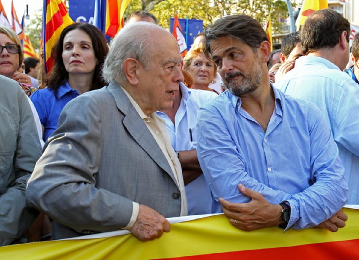 Jordi Pujol conversa amb el seu fill Oriol durant la manifestació independentista de la Diada, el setembre passat.