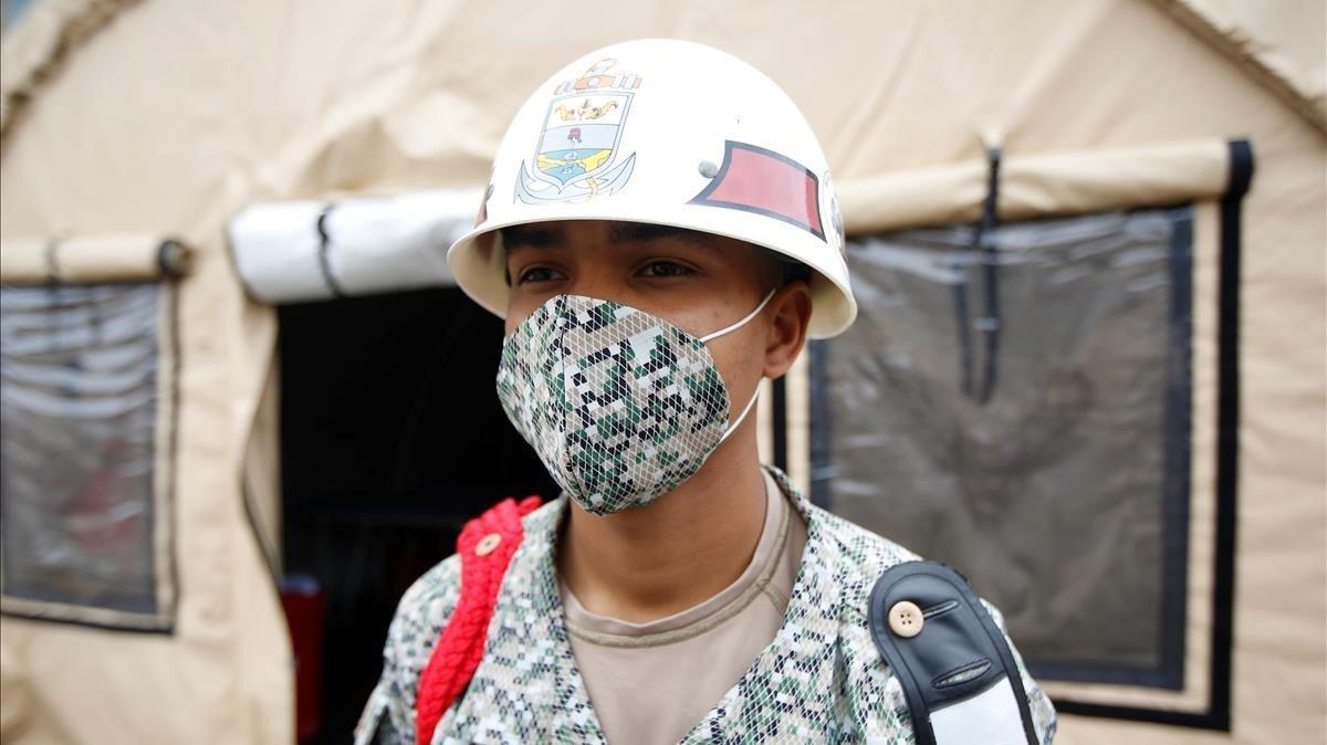 zentauroepp52900878 a colombian soldier wearing a face mask is seen outside one 200324181908