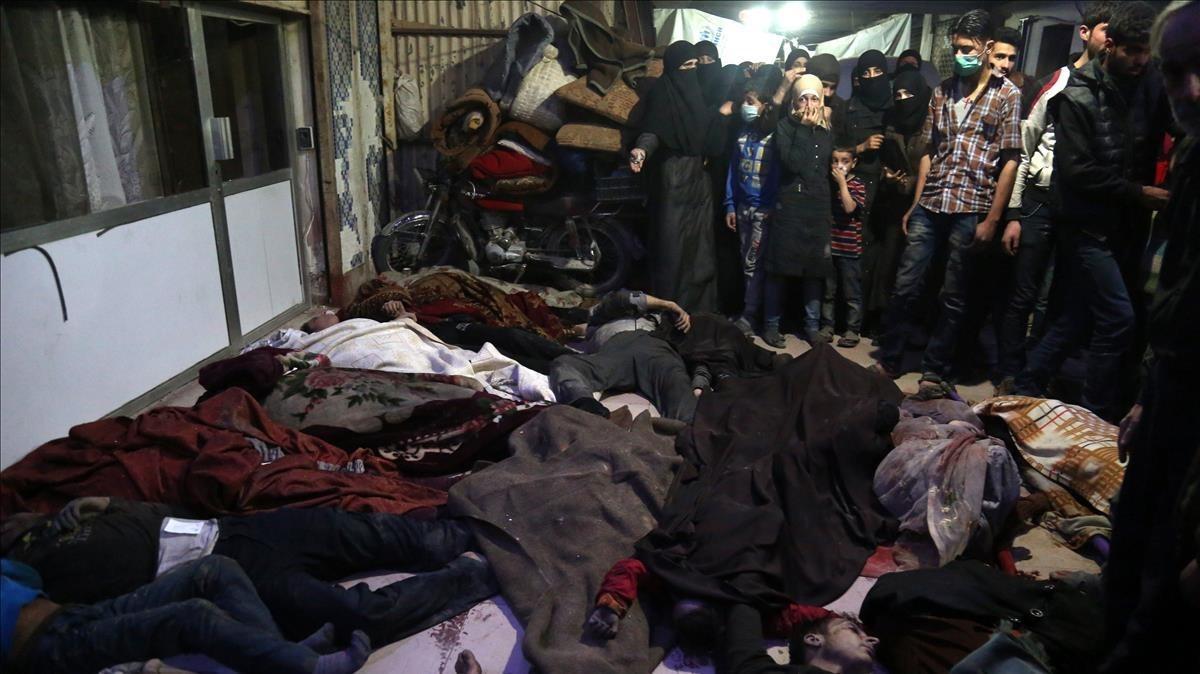 undefined42841313 douma  syrian arab republic   08 04 2018   bodies of victims180409220215