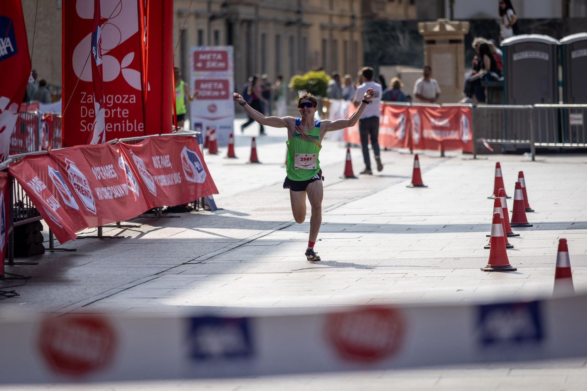 En imágenes | La carrera Ponle Freno sca a la calle a miles de personas en Zaragoza