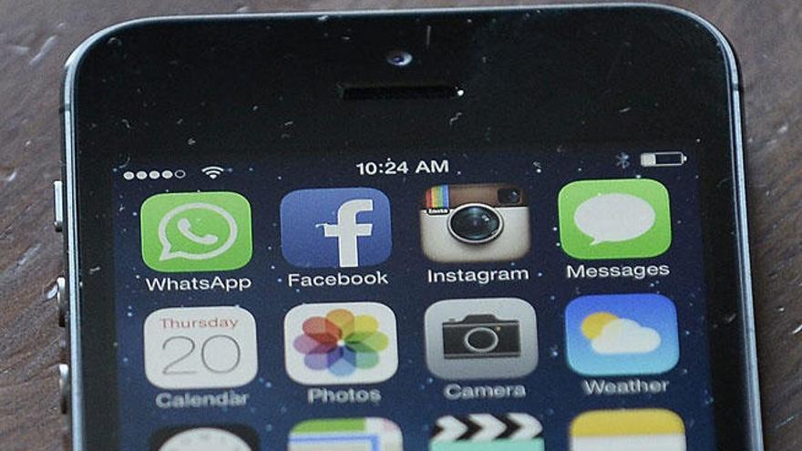 El icono de WhatsApp y de otras apps, en un iPhone.