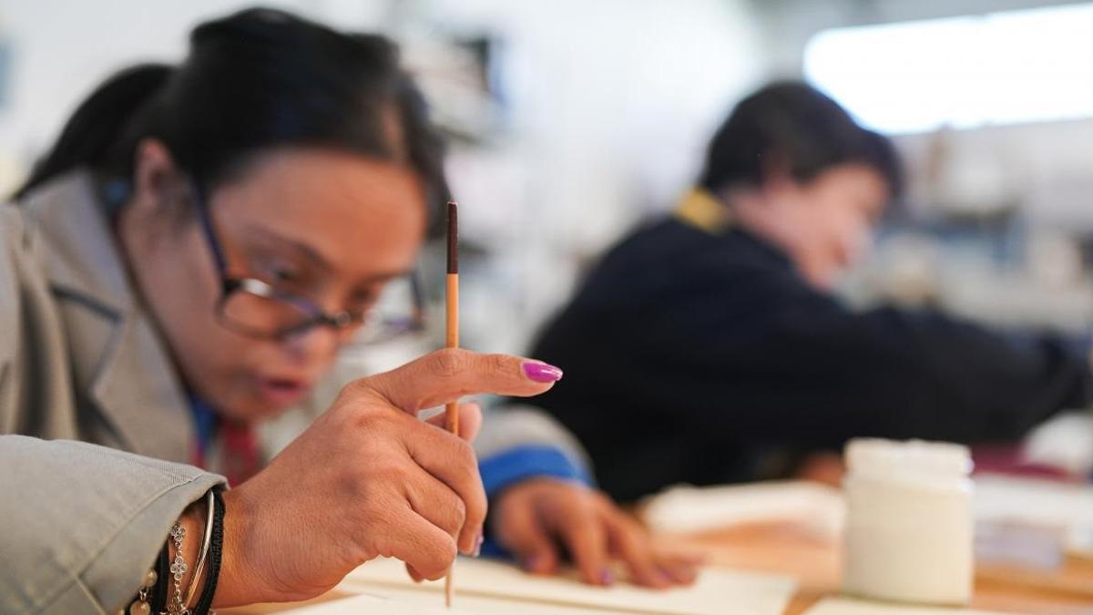 Personas de distintas capacidades en su trabajo