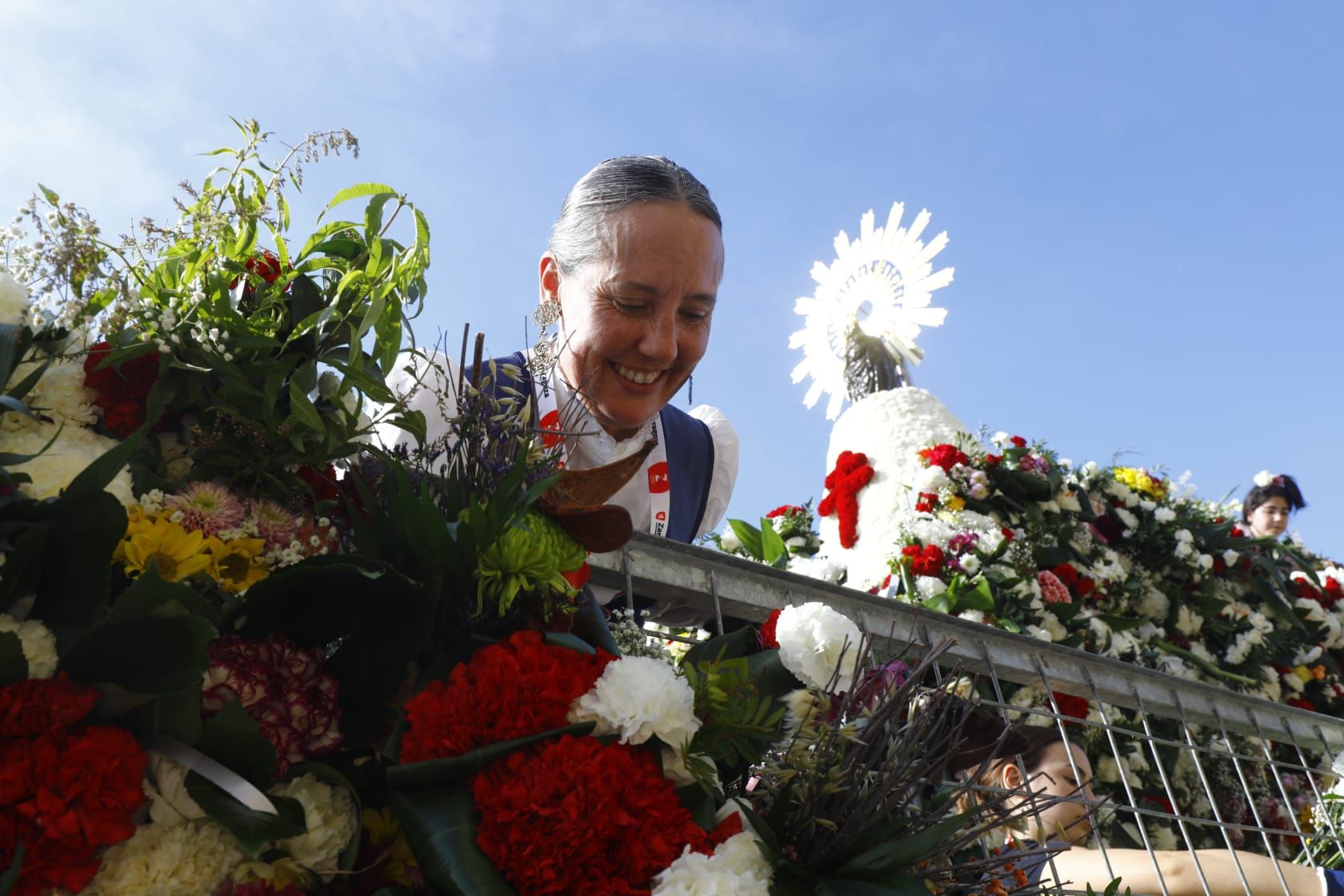 En imágenes | Zaragoza vive su día grande con la Ofrenda de Flores a la Virgen del Pilar