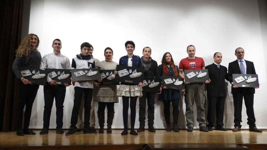 Foto de familia de los premiados.